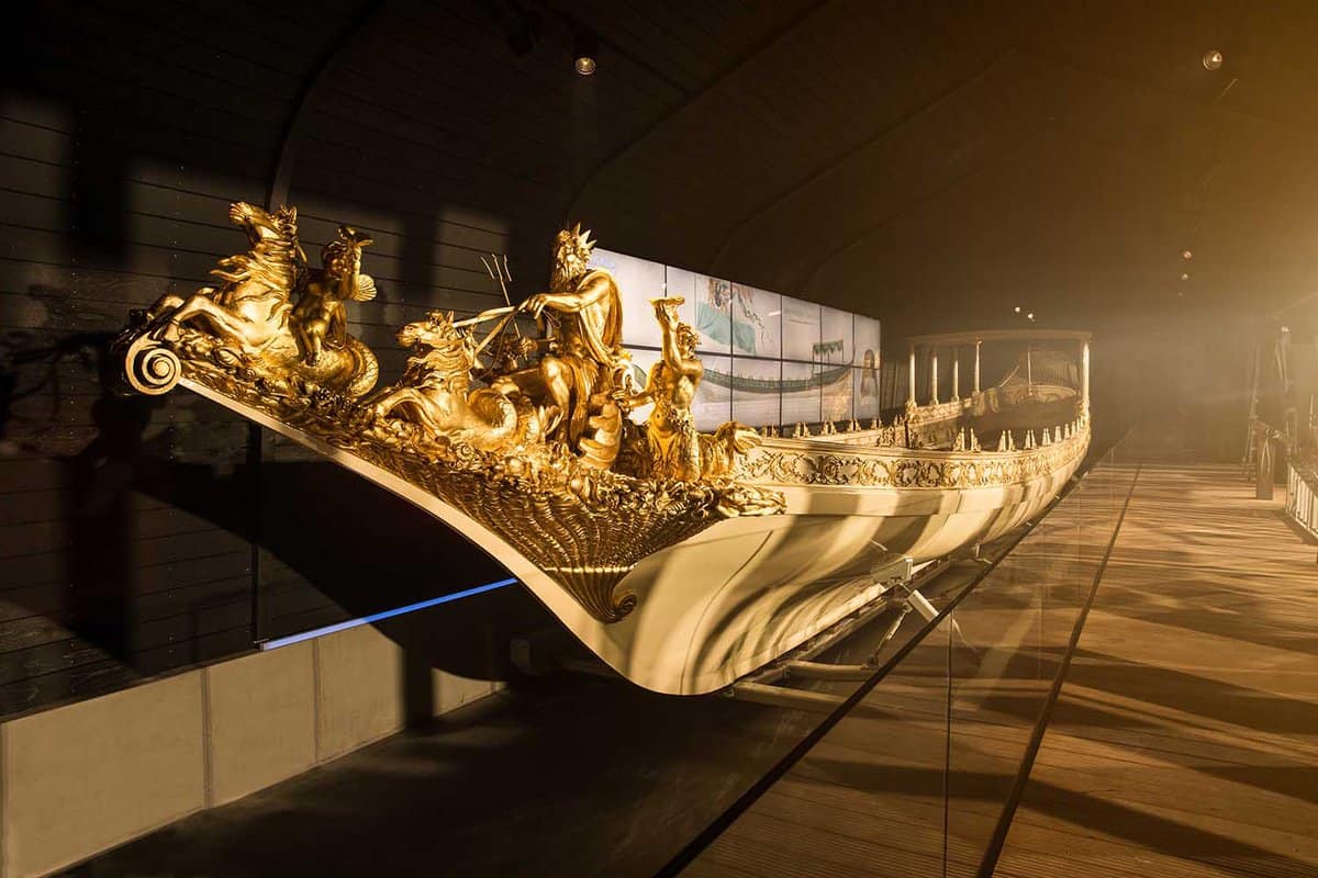 An ornate golden ship front