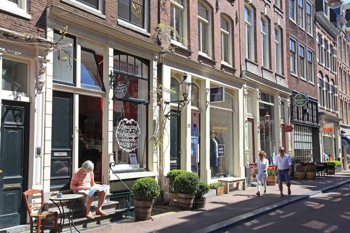 View of several boutique shops on a pretty street