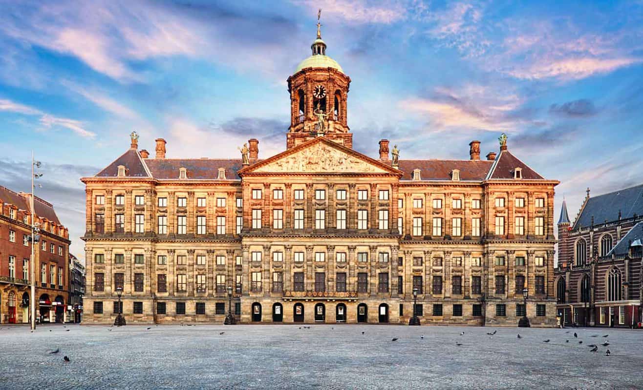 External view of large building during the dawn