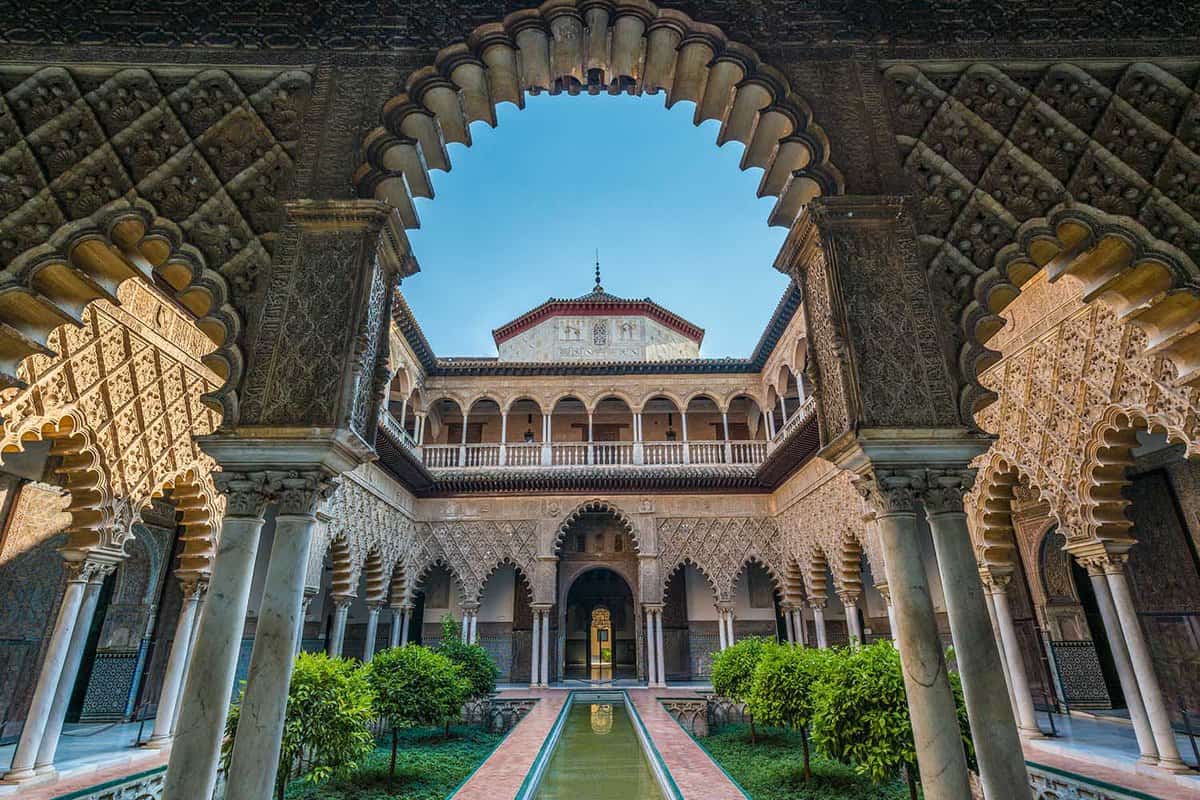 View of the palace courtyard through a Moorish arch