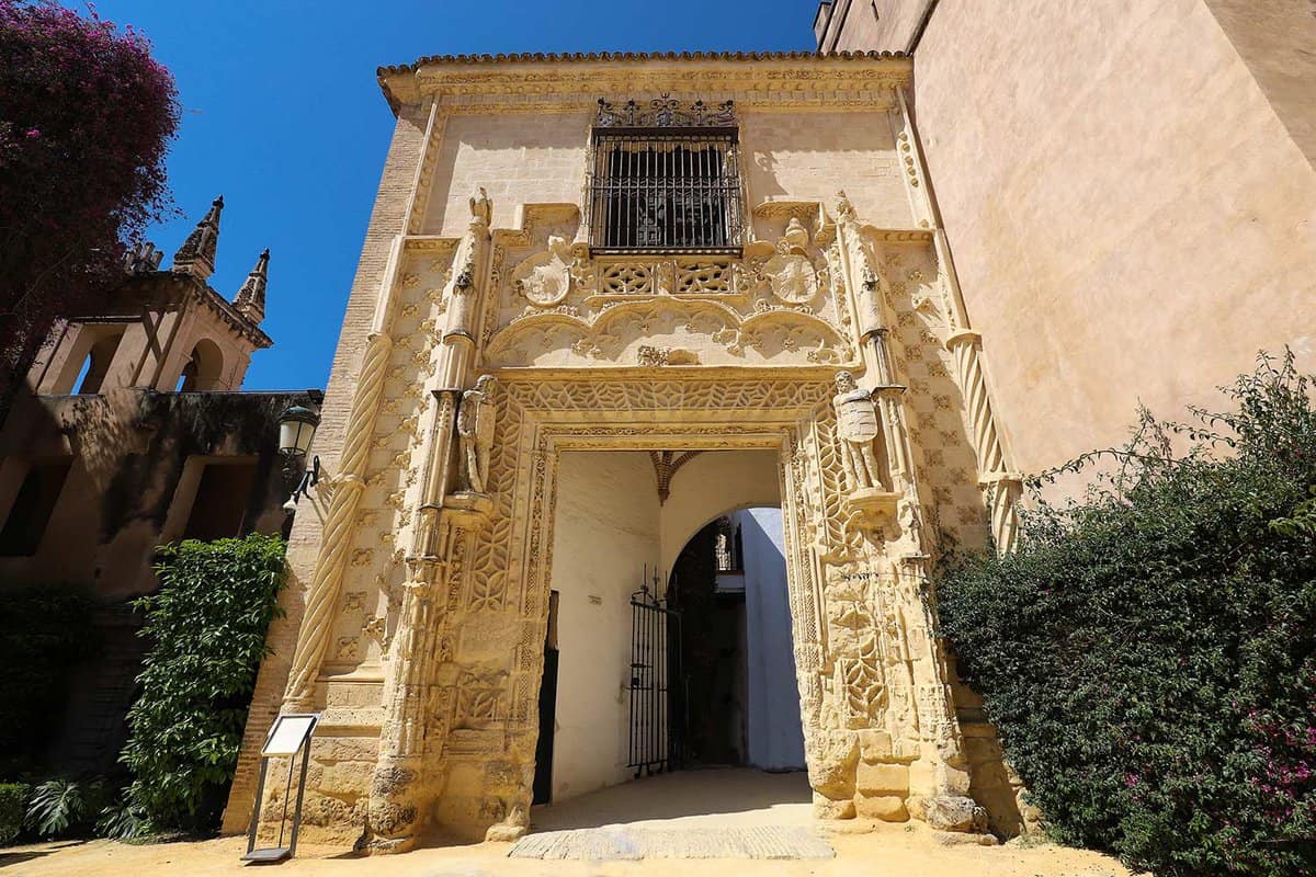 An external entrance with intricate stonework around a door
