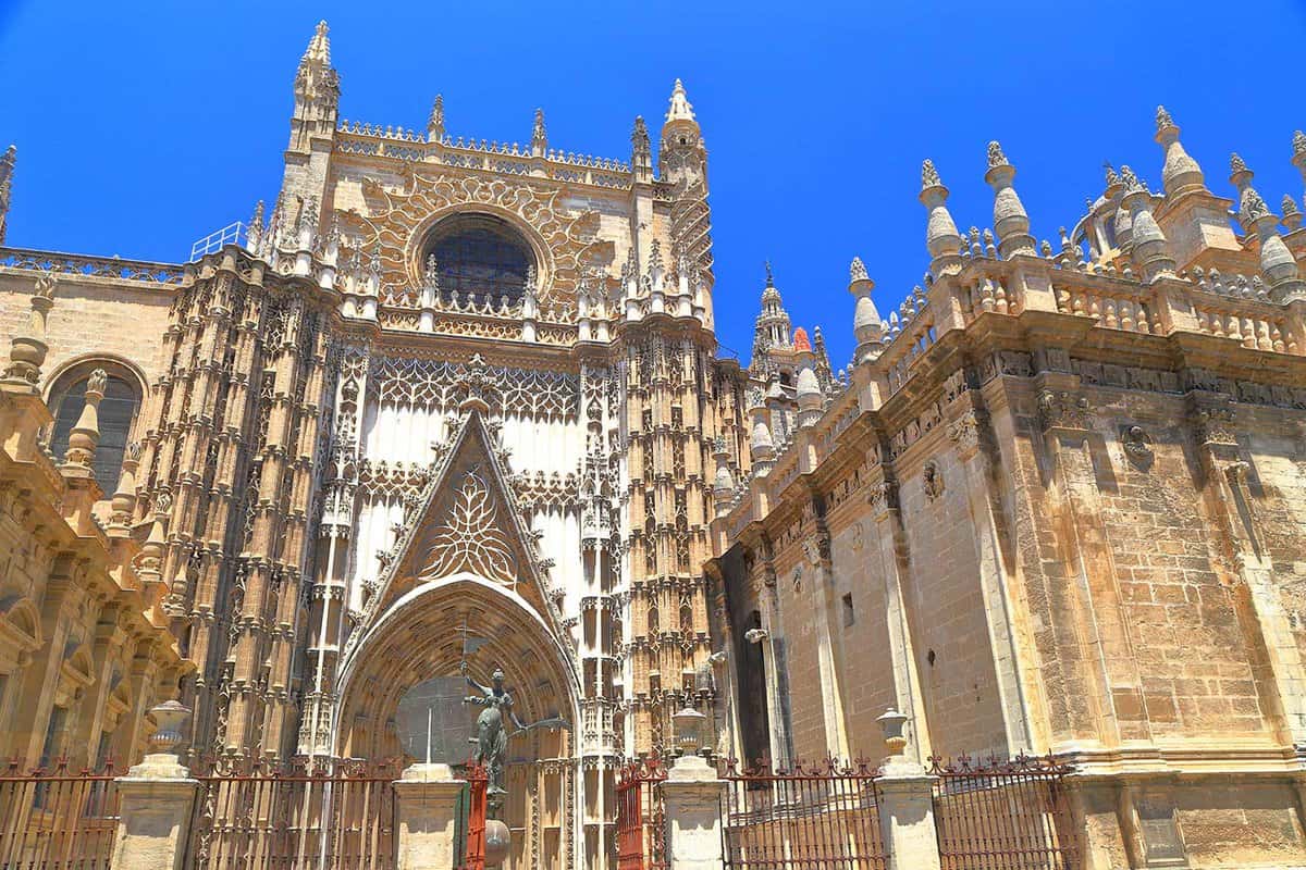 Exterior of the cathedral on a sunny day showing intricate stonework and spires