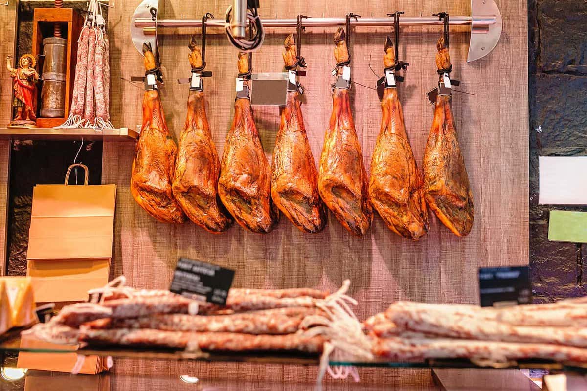 Traditional Spanish jamon ham for sale at the market