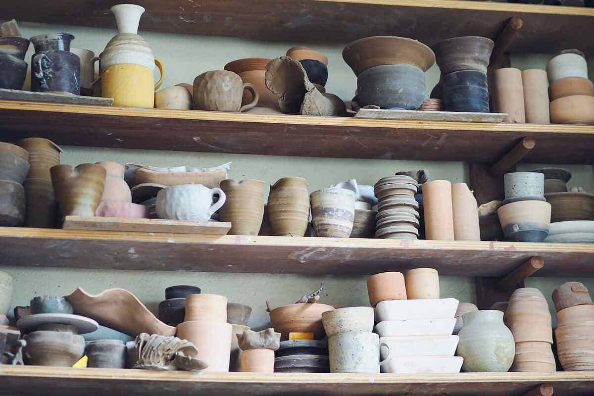 row of shelves with cermaic pottery at Aoon in Bangkok