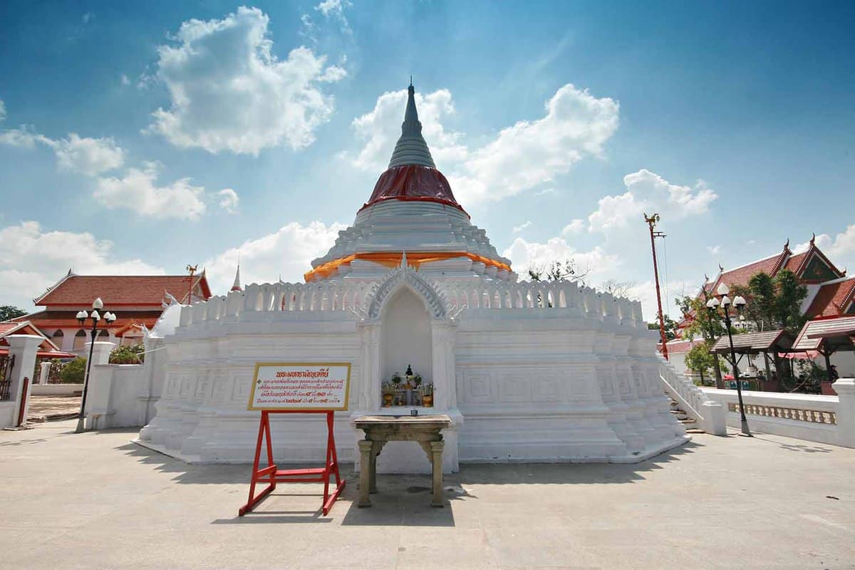 Large white temple with pointed dome