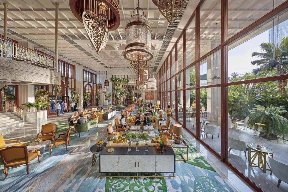 Luxury lobby with greenery as decoration and chandeliers
