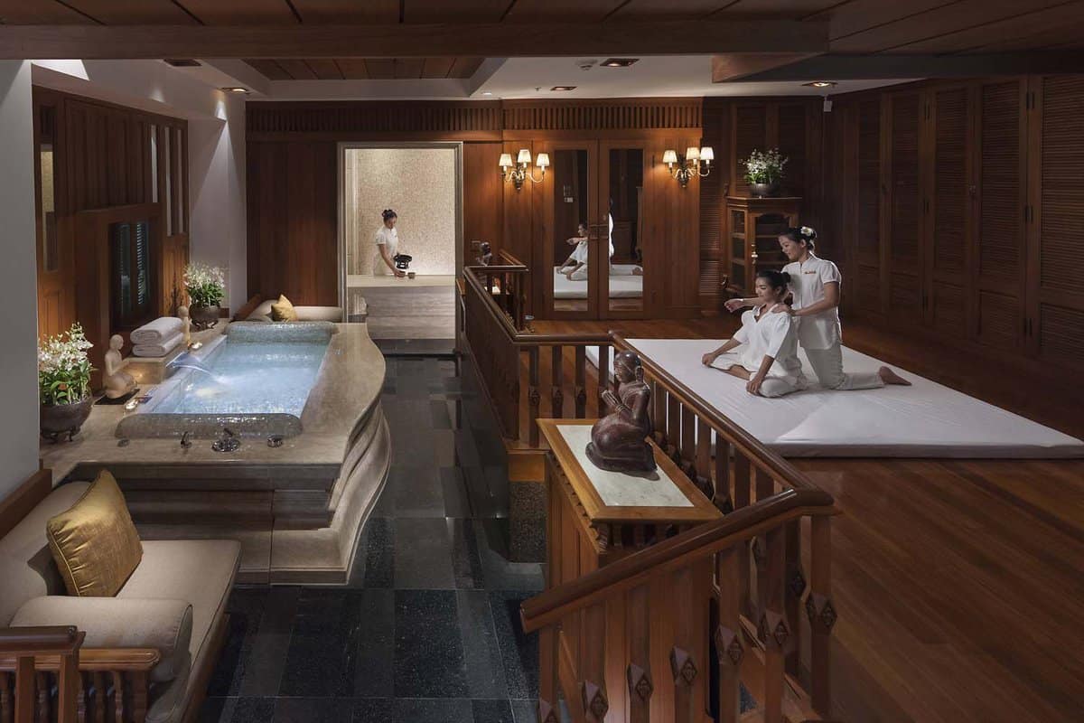 Spa and massage room with wood panels