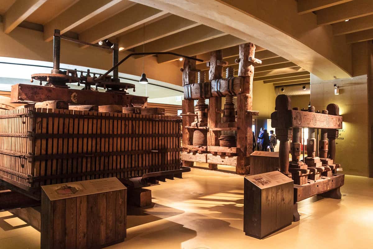 view of interior of museum with wine making machinery