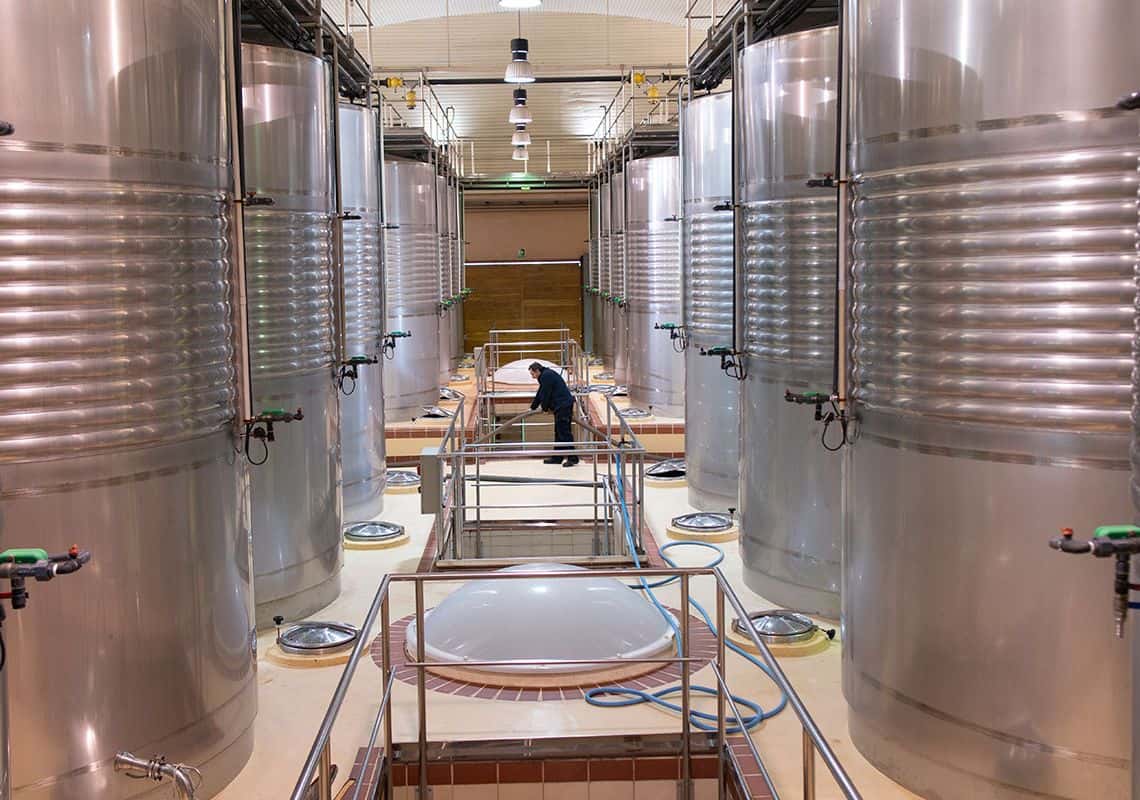 silver wine vats in a row