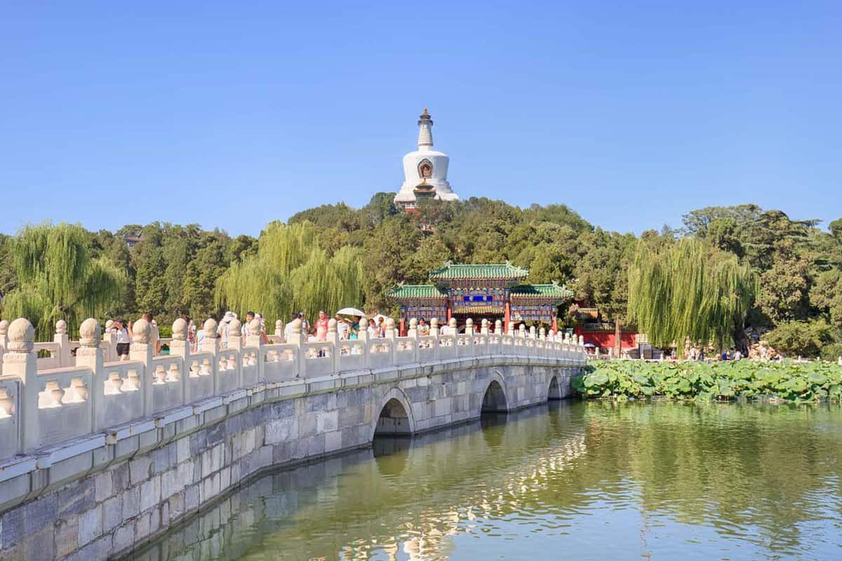 White Stone bridge at Beihai Park. It is the former imperial garden, built in 11th century. One of the largest Chinese gardens with historical structures, palaces and temples.