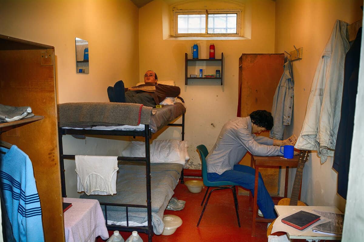 Prison room with 2 mannequins acting as prisoners