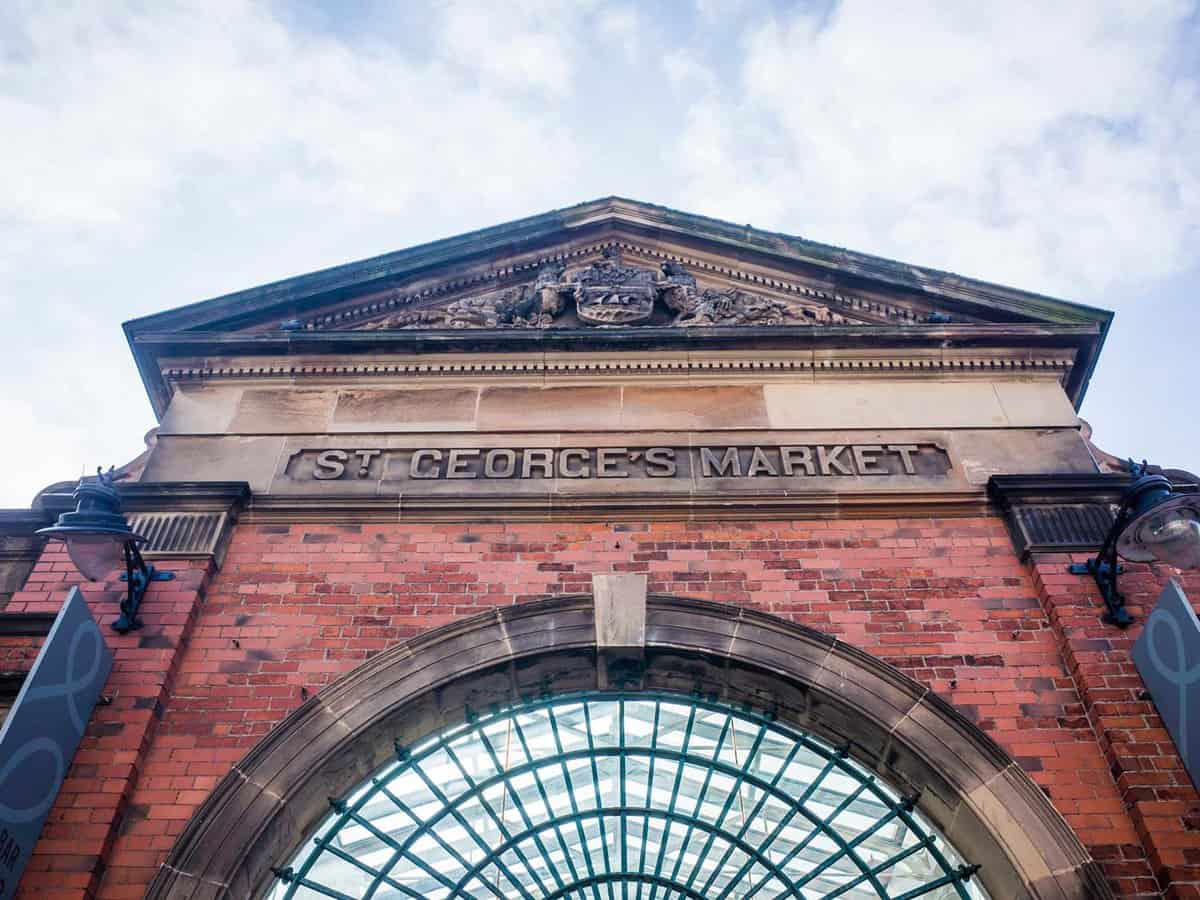 The exterior of the historical St George's Market showing roof above the entrance