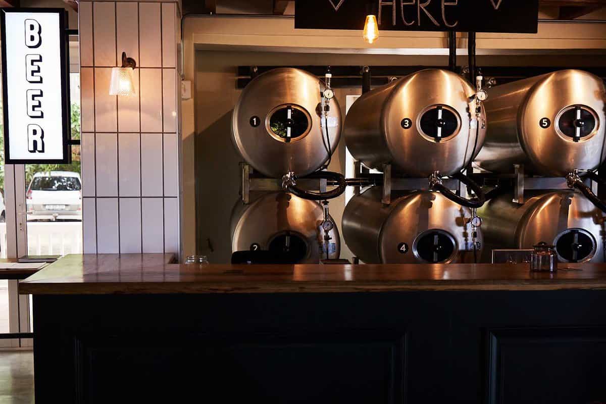 Close up of beer vats on the wall in the bar