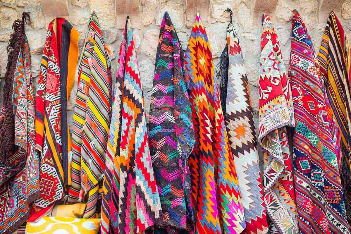 colourful cappadocian carpets made in Avanos hanging on a shop wall
