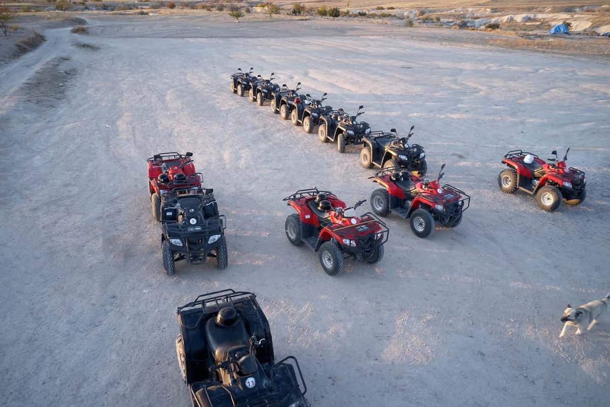 A view of 5 quad bikes from above.