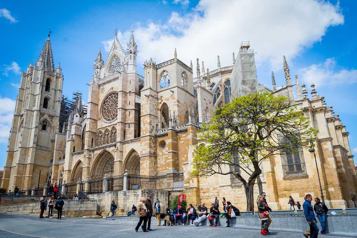 view on the cathedral, also called The House of Light or the Pulchra Leonina, on a sunny day in spring, with people in the foreground