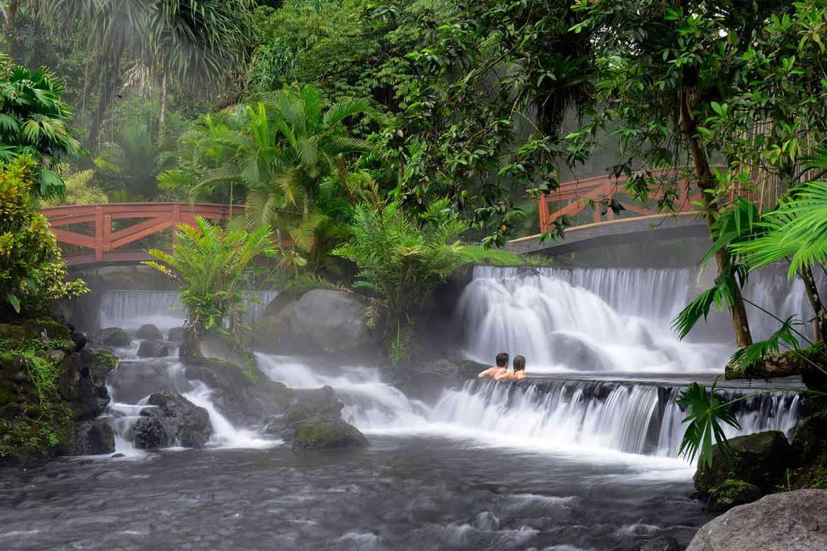 Small waterfalls of thermal water in the rainforest