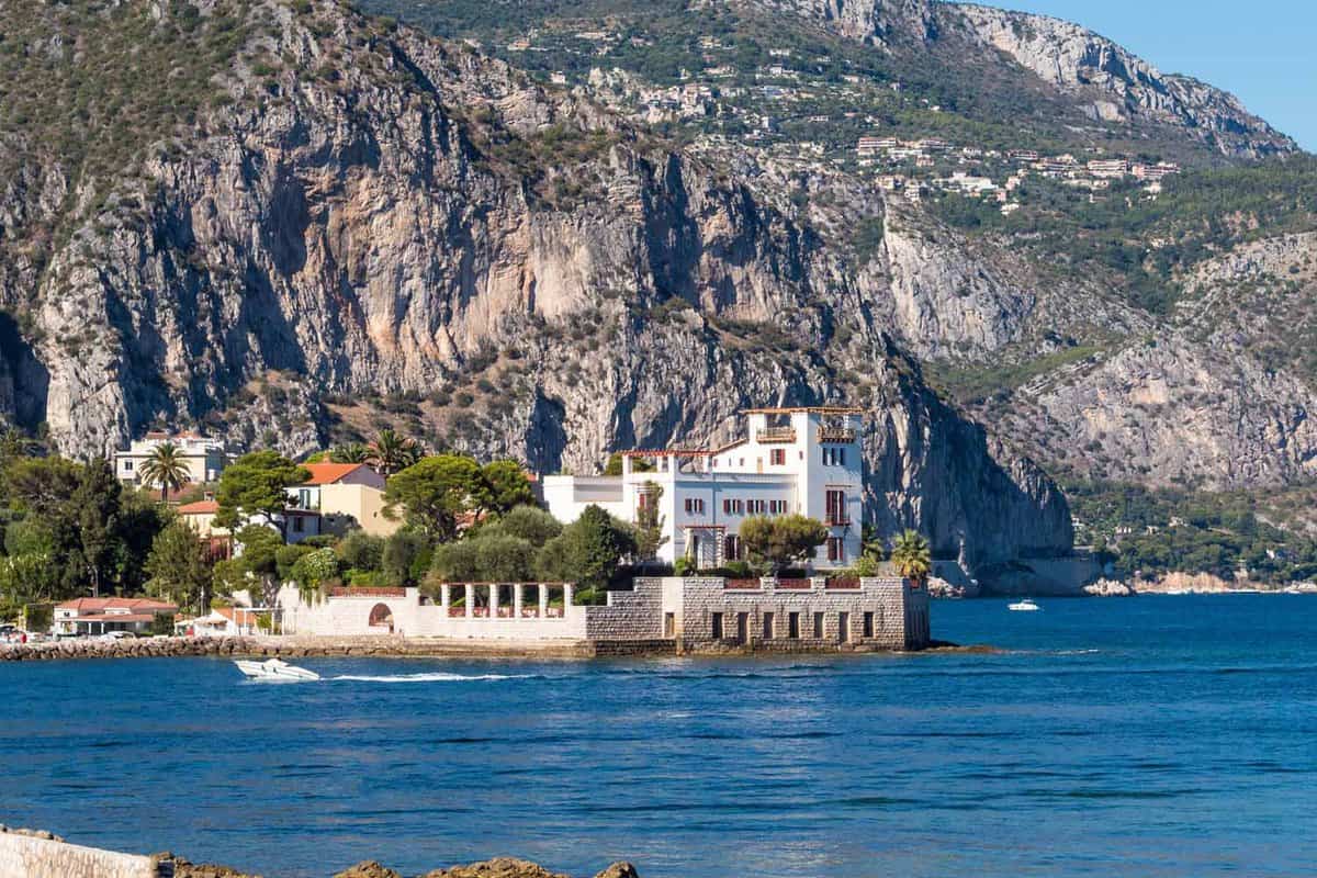 Large white villa built on a pinnacle stretching out into the sea