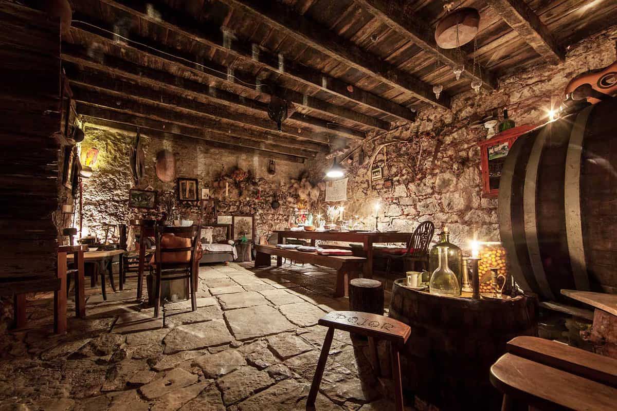 stone walled interior of a small restaurant
