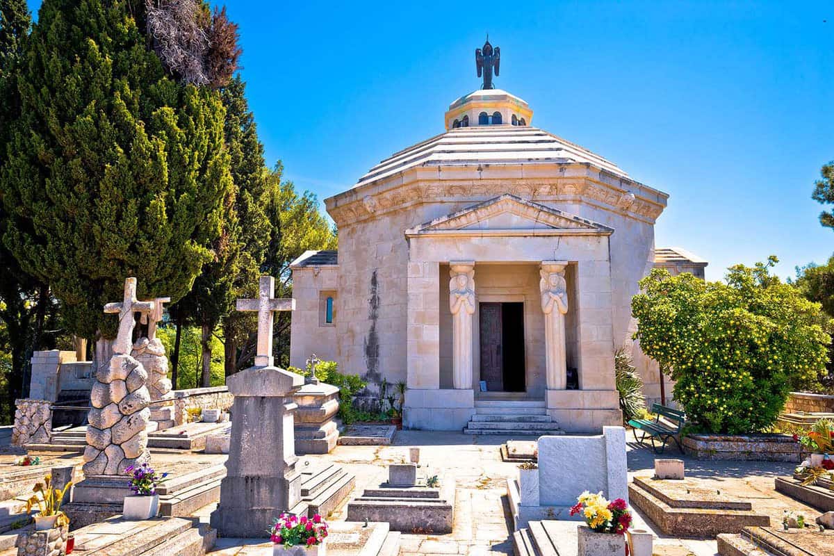 Church graveyard with large Greek crypt