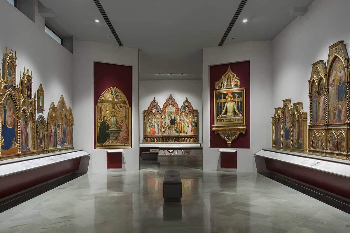 Exhibition room with religious masterpieces on the walls