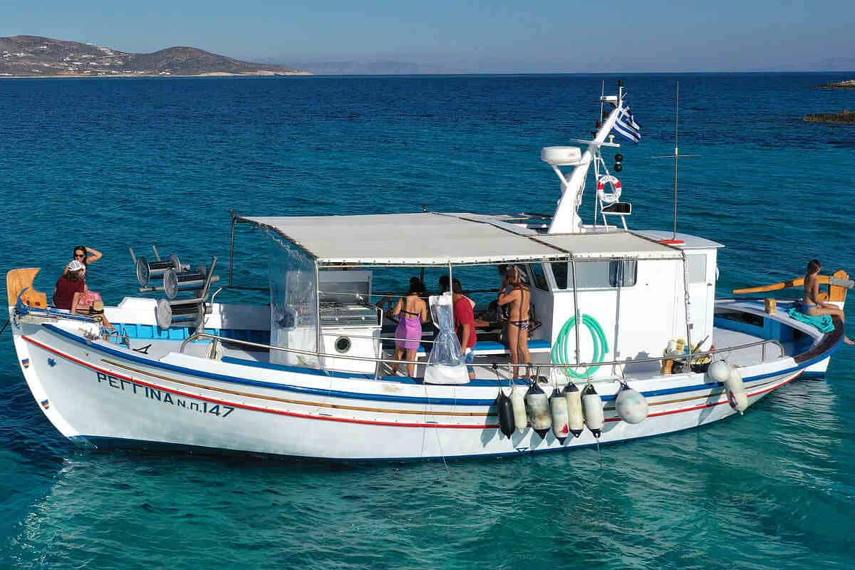 wooden caique boat used by Fishing tours on the Regina in Paros