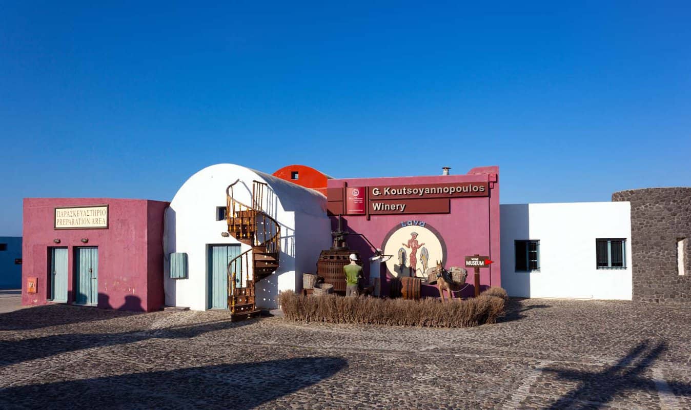 Entrance alley of red and white Wine museum and vinery buildings