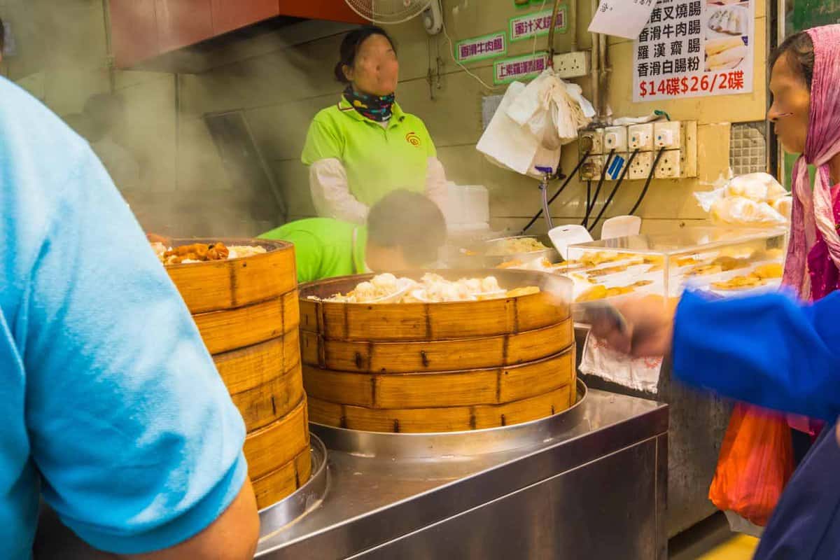 Fresh steaming dim sum being sold by a street food vendor