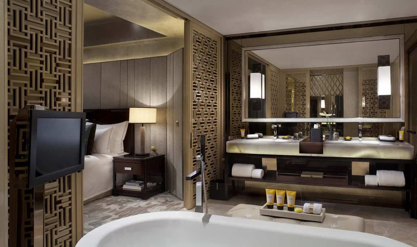 Large double sink bathroom with marble bath tub
