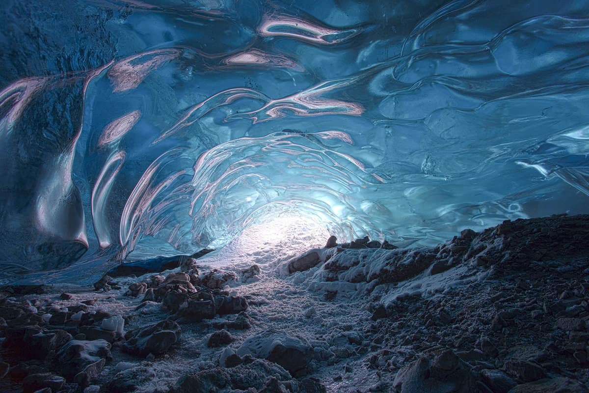 Amazing Blue Ice Cave in the heart of a glacier near Jokulsarlon, Vatnajokull National Park, Iceland