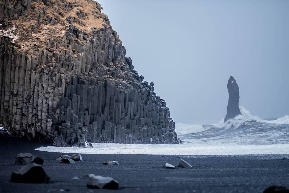 Reynisfjara Beach, a black sand beach in southern iceland. view of sea and cliffs