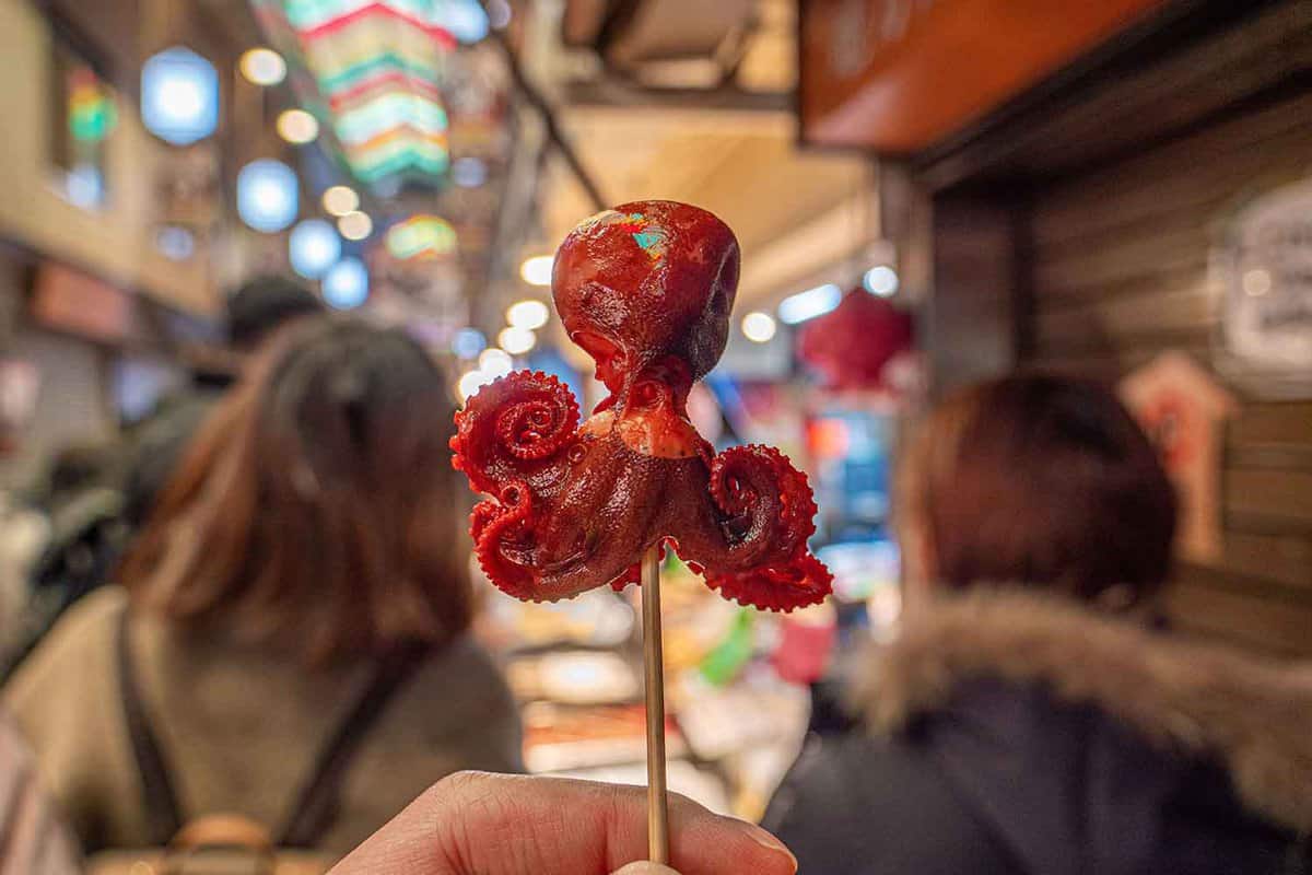 "Tako-Tamago" or baby octopus boiled in sweet soy sauce is snack that can find in Nishiki Market in Kyoto, Japan