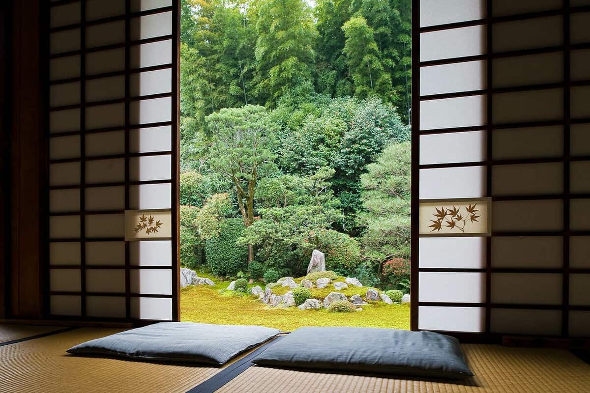 Shoji doors open onto green garden