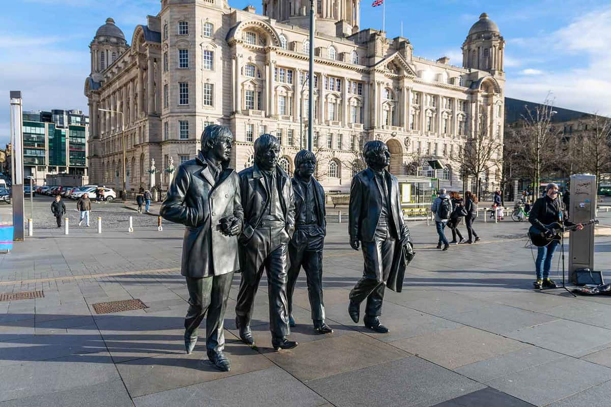 Bronze statue of four men