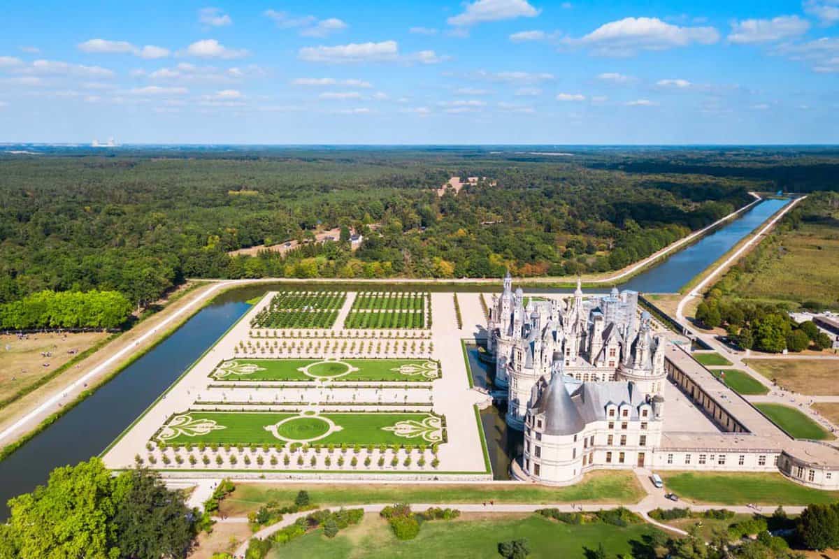 An aerial view of Loire Castle, the River Loire and the wilderness in the background from the hot air balloon