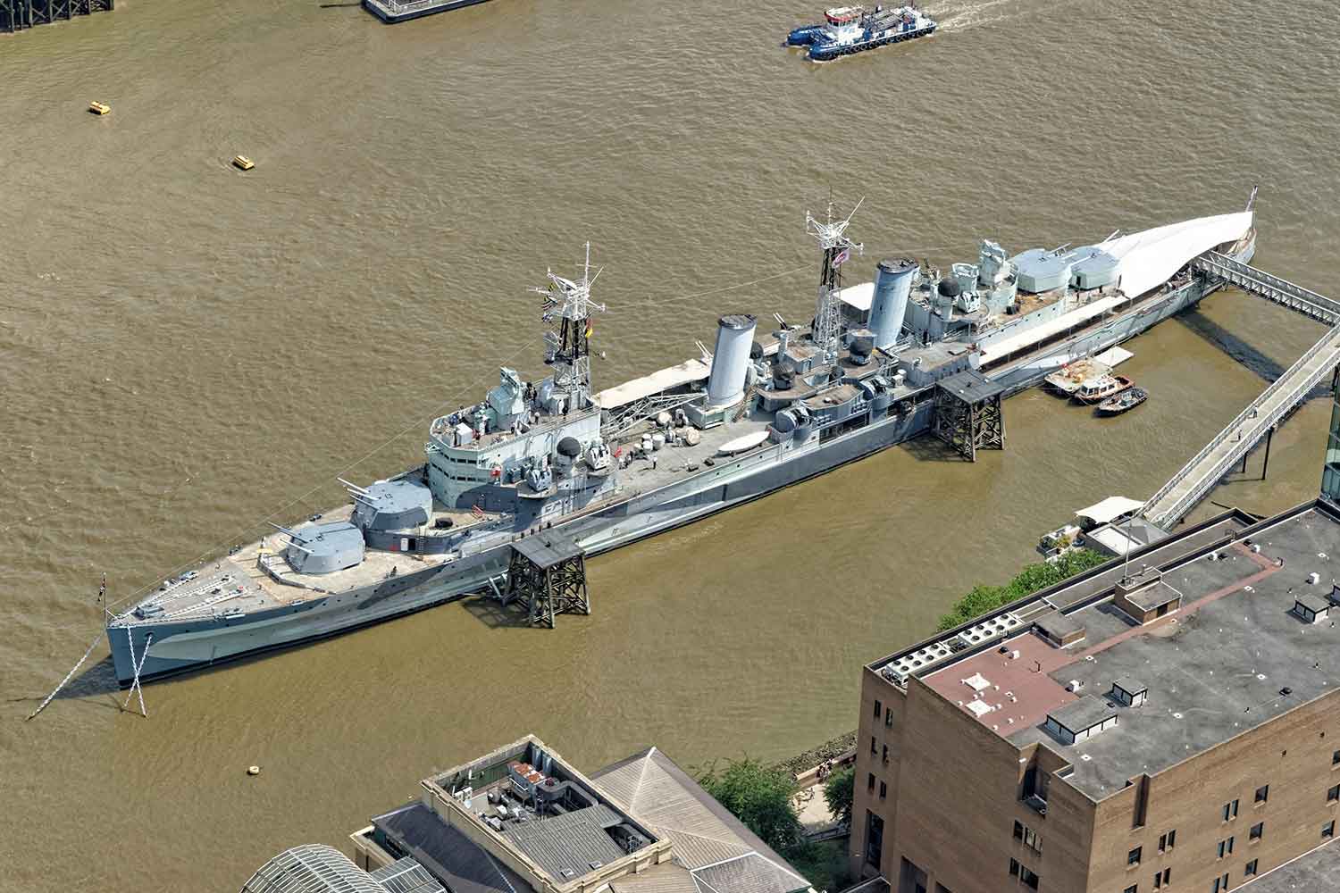 Aerial view from above of ship in the river thames