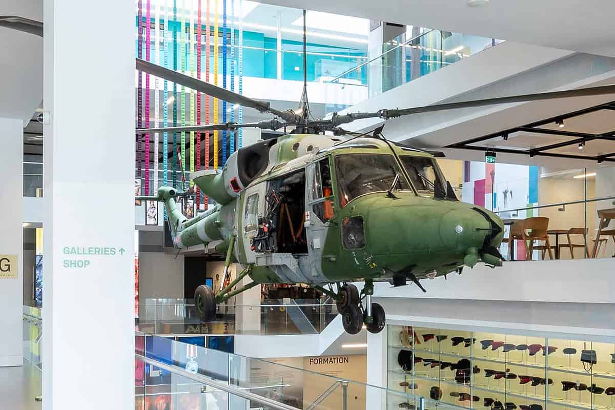 Army helicopter suspended in a museum exhibition hall