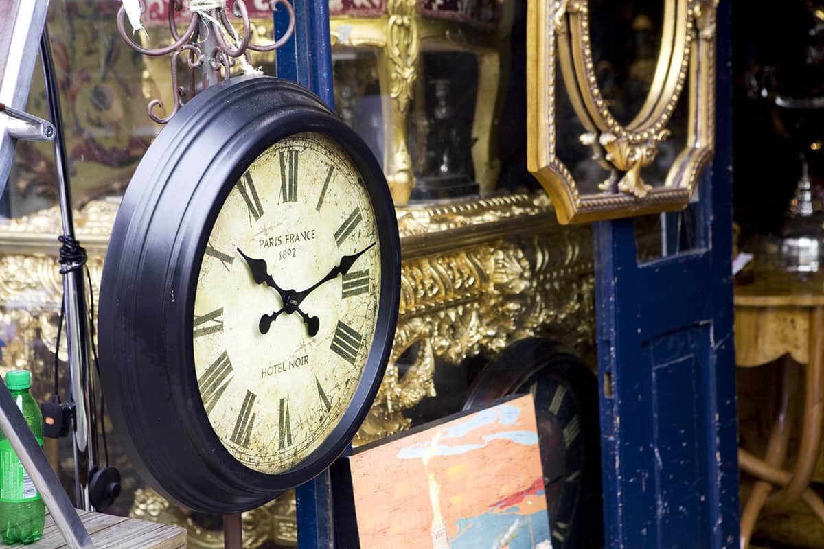Close up of an antique clock in an antiques shop