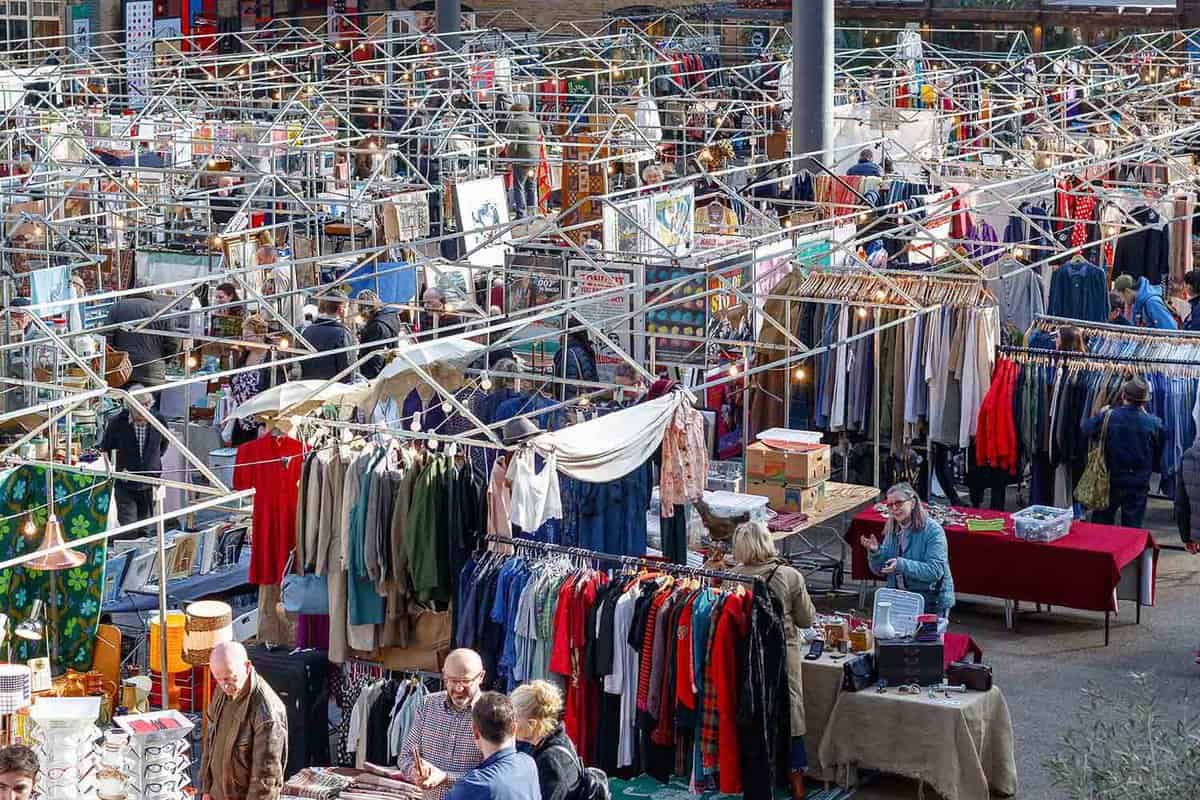 Elevated view of people shopping at the clothing market during the daytime