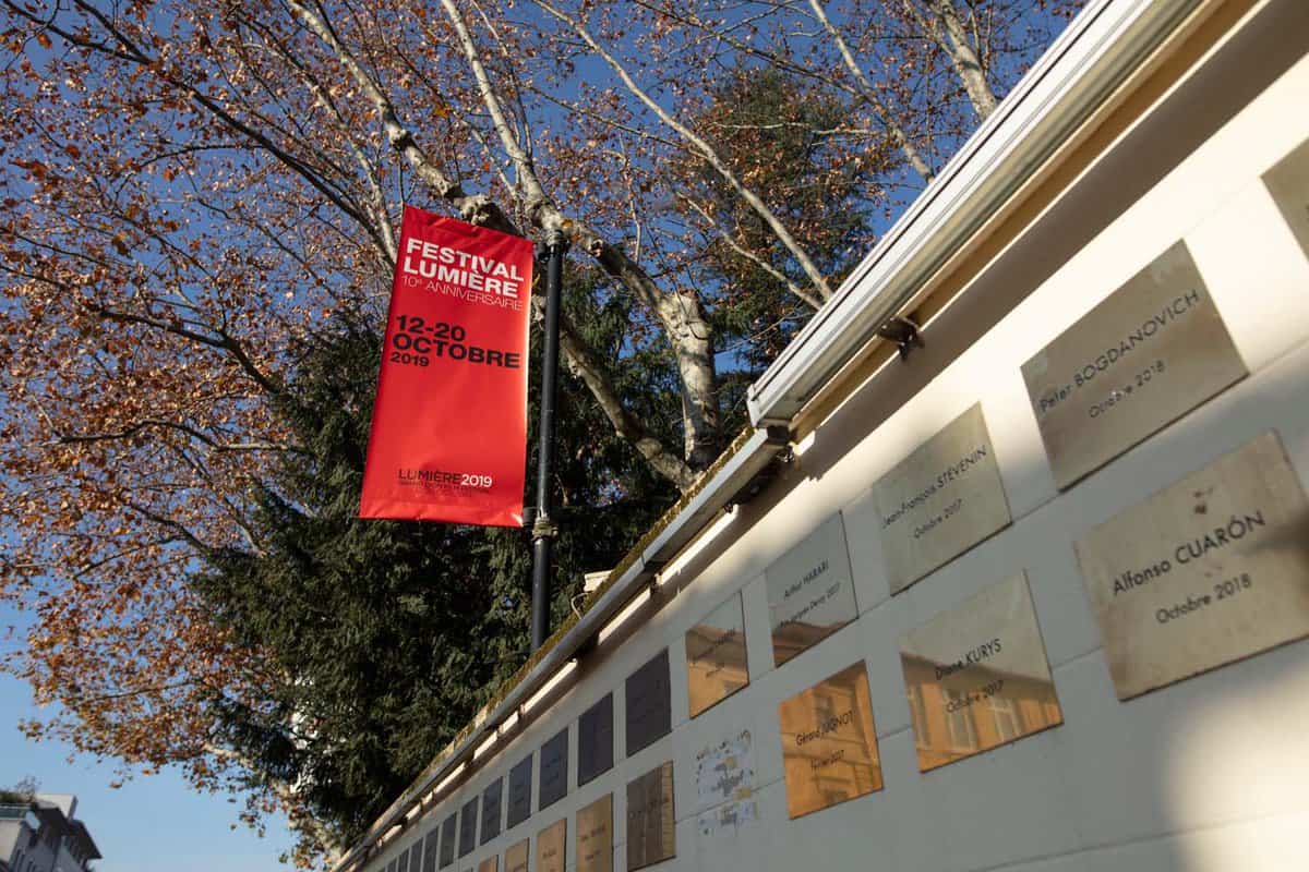 Red flag hanging from side fo the building