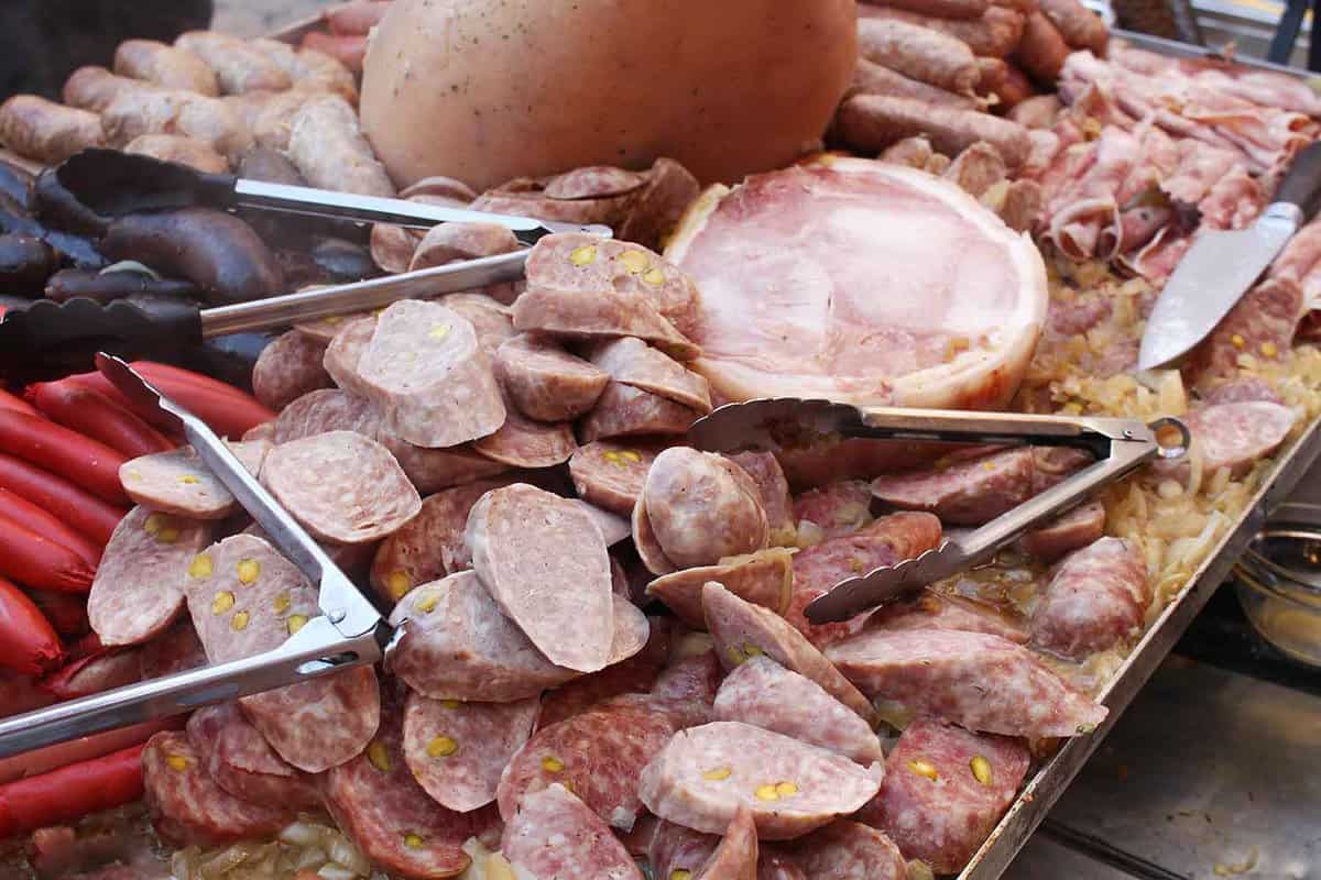 close up of pieces of chopped sausage