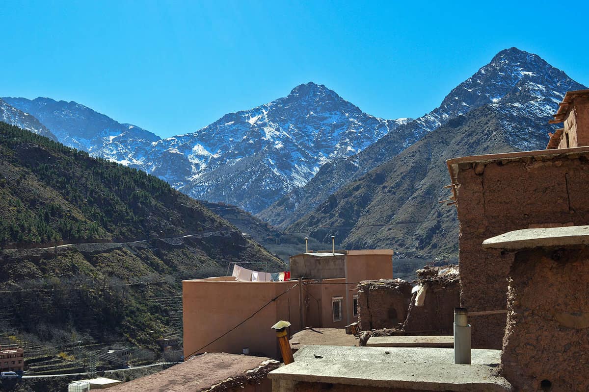 Snowy peaks in the Atlas Mountains against a blue sky