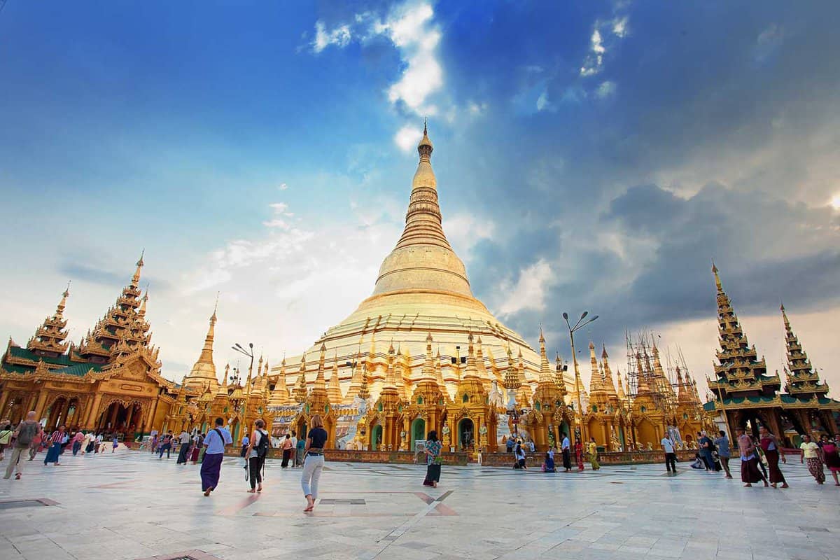 The golden pagoda soars into the sky in the centre of the complex