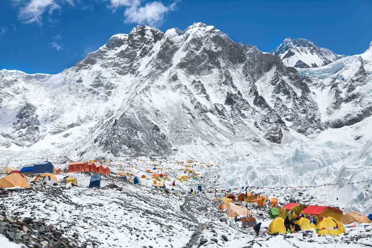 Bright yellow tents in Mount Everest base camp, Khumbu glacier and mountains, sagarmatha national park, trek to Everest base camp - Nepal Himalayas