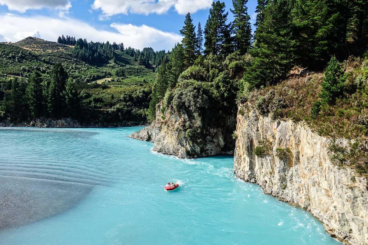 Jetboat on a turquoise glacial lake