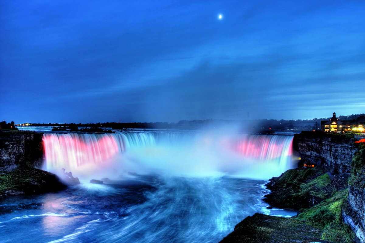 night time view with falls lit up