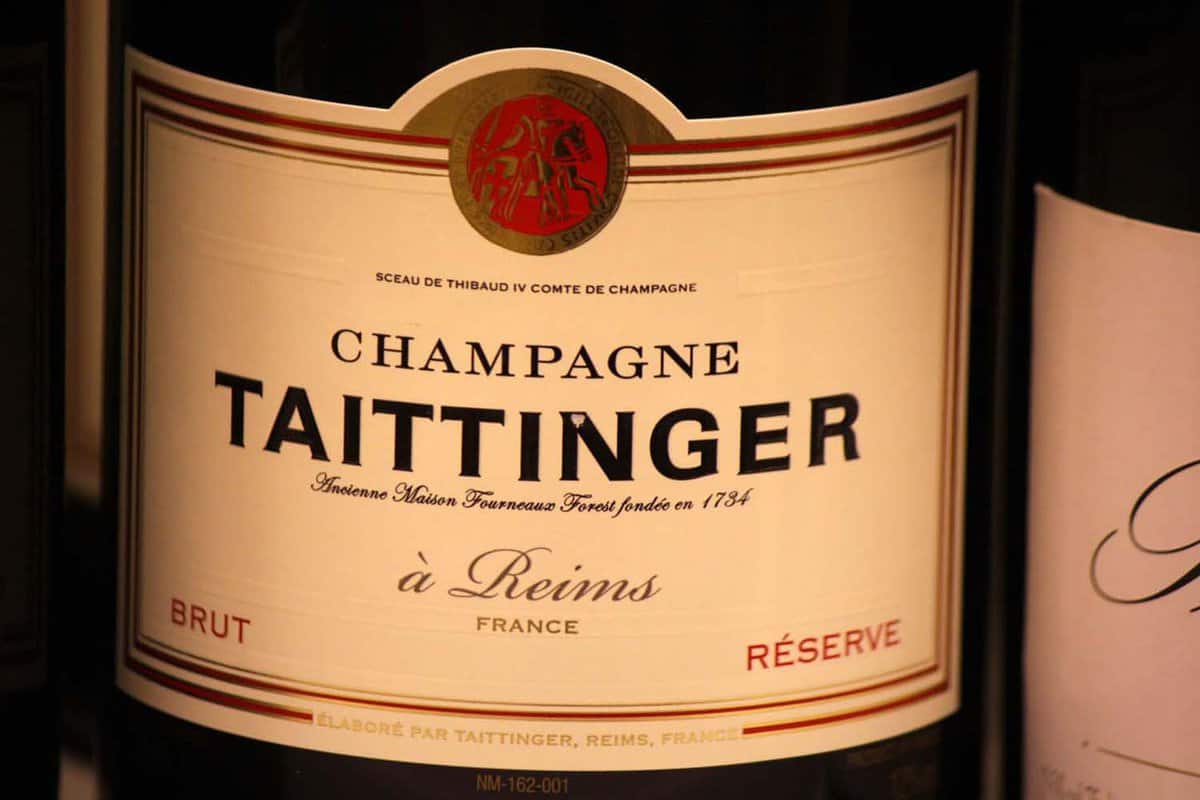 A close up of the logo brand "Taittinger" at Reims