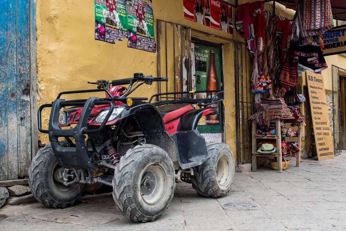 A large quad bike on the street in Ollantaytambo