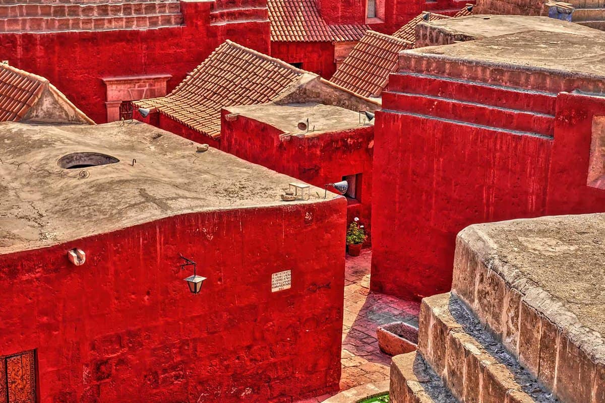 Red painted buildings inside the monastery
