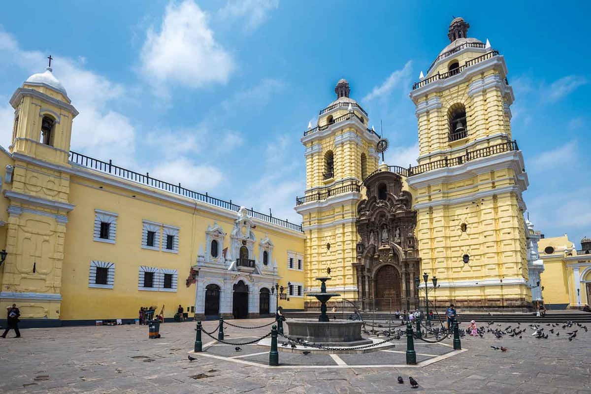 Pale yellow building of Convento de San Francisco in Lima